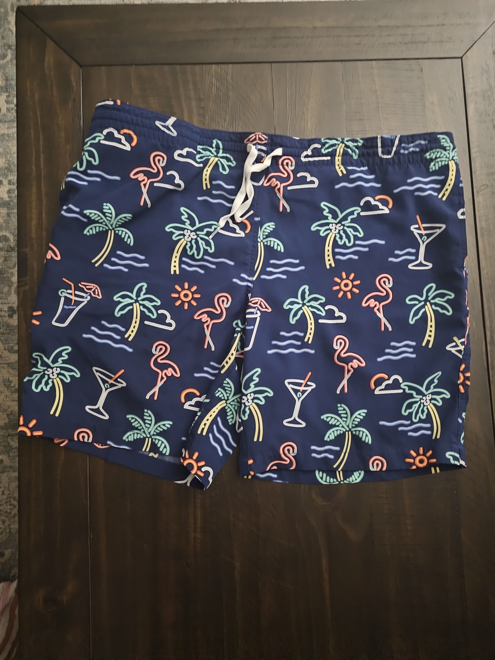 chubbies Navy Tropical Neon Flamingo Swim Trunks